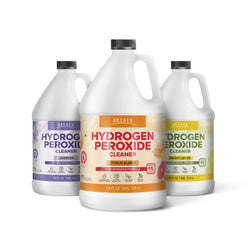 Three hydrogen peroxide products in one gallon plastic jugs with laminated labels